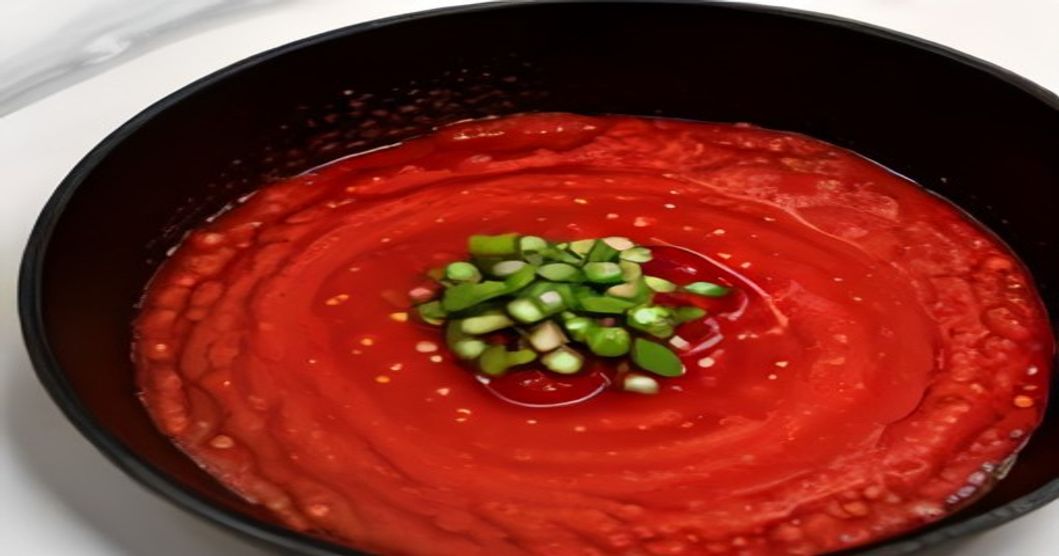 Gochujang being stirred into a Korean dish